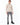Romeo Turtleneck Sweater in Beige – full-length front view with gray ripped jeans and black boots