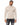 Tyson Sweater in Beige – front view on model, ribbed turtleneck, cuffs and hem, worn with ripped black jeans