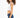 Side view of a woman in the Luna white ribbed cropped tank top with ruched detailing and dark blue denim jeans.