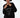 Model wearing a black oversized sweatshirt with 'WANNA TALK' and 'I DON'T HAVE A TYPE' white graphic text.