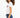 Side view of L.A. Vibes White Crop Top with red graphic on a model with curly hair, paired with dark blue jeans.