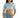 Jaylah light blue cropped button-down shirt with pockets, paired with high-waisted denim shorts for a streetwear look.