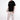 Man wearing black Survive Graphic T-Shirt with white text, paired with tan cargo joggers and black sneakers.