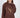 Model wearing a brown NY graphic sweatshirt with ribbed crew neck and oversized streetwear fit.