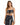 A model poses in a dark patterned two-piece outfit featuring a knotted crop top and a matching wrap skirt.