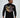 A person wearing a black long-sleeve shirt featuring colorful abstract text and graphic designs on the back.