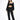 Model in Carbon 3-piece tracksuit set with a 'Relax' tube top, zip-up hoodie, and joggers for urban streetwear.