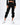 Black jogger pants, featuring an elastic waistband and cuffed ankles, paired with white sneakers.