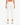 Cream-colored joggers with an elastic waistband and side pockets, worn with white sneakers.