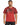 A man wearing a red graphic t-shirt with abstract patterns and a motivational quote in white text.