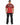 A person wearing a red graphic t-shirt with a bold design on the back, paired with black pants.