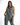 Model in Faye Denim Jumpsuit, a sleeveless blue washed utility one-piece with front zipper and cargo pockets.