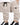 Light beige joggers featuring an elastic waistband, side pockets, and elastic cuffs, paired with black and white snea...