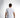 A man wearing a fitted white short-sleeve shirt stands with his back to the camera, showcasing a minimalist design.