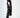 Finaley black velvet romper for women featuring white contrast piping, a belted waist, and streetwear design.