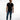 Man in Finn Blue Denim Jeans and black graphic t-shirt for a streetwear look against a white background.