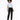 A model poses in a light blue cropped top with button details and two front pockets, paired with black trousers.