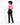 A model with curly hair wears a short-sleeve pink top and black pants, posing from the back against a light background.
