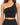 Black ribbed crop top featuring a stylish one-shoulder design and a fitted silhouette.