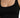 Close-up of a black ribbed crop top featuring a wide neckline and thin straps, showcasing a fitted silhouette.