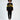 Model in black ALPES streetwear crop top with yellow graphics and stripe sleeves, paired with matching ribbed joggers.