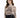 A woman models a fitted, long-sleeve top featuring intricate graphic designs and a high neckline.