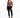 A model poses in a fitted long-sleeve top with a V-neck and cut-out details, paired with black skinny jeans and sneak...