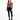 A model poses in a fitted long-sleeve top with a V-neck and cut-out details, paired with black skinny jeans and sneak...