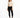 A model poses in a fitted long-sleeve top with cut-out details, paired with black skinny jeans and sneakers.