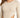 Close-up of a model wearing a ribbed long-sleeve bodysuit with a side cutout in a neutral beige color.