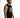 A man with a beard wearing a sleeveless black shirt featuring colorful text, posed against a white background.