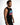 A man with a beard wearing a sleeveless black shirt featuring colorful text, posed against a white background.