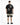 A person wearing a black t-shirt with artistic angel and devil graphics on the back, paired with gradient shorts.