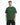 A man wearing a green oversized t-shirt with white text on the front, paired with black cargo shorts.