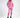 Model wearing a pink long-sleeve Gem Romper with drawstring waist and zip-up collar, paired with black platform boots.