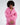 Pink long-sleeve Gem Romper with zip-front, snap collar, and drawstring waist. Front view on model.