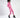 Model in a pink Gem Romper with drawstring waist and cargo-style pockets, paired with black platform boots.