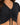 Black cropped top featuring a V-neckline and gathered detailing with adjustable ties at the front.