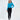 Model wearing the Goldie long sleeve blue ribbed crop top with a shoulder cutout and high-waisted dark jeans.