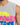 Gray sleeveless shirt featuring vibrant yellow, pink, and blue graffiti-style text design.