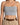 Light gray cropped top with thin straps, paired with high-waisted beige trousers and a braided brown belt.