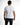 Back view of the Painted King white graphic streetwear t-shirt with Keep On Rising text on the shoulder.