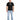 A man stands wearing a black t-shirt with a graphic design, paired with light blue jeans and black shoes.