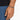 A close-up of a hand wearing a beaded bracelet with a mix of gray and black stones, resting on denim.