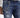 Close-up of distressed blue jeans featuring a silver chain attached to the belt loop, styled with a white long-sleeve...