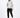 A man stands confidently in a light gray hoodie with a graphic design, paired with black cargo joggers and white snea...