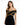 A woman models a fitted black dress with off-the-shoulder sleeves and intricate gold detailing.