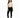 A model poses in a fitted beige long-sleeve top with cut-out details, paired with black skinny jeans and sneakers.