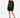 A woman stands in a black oversized sweatshirt featuring a circular white text design, paired with black heeled boots.