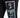 Black sweatpants featuring a graphic patch with a stylized bust and abstract blue design on the thigh.